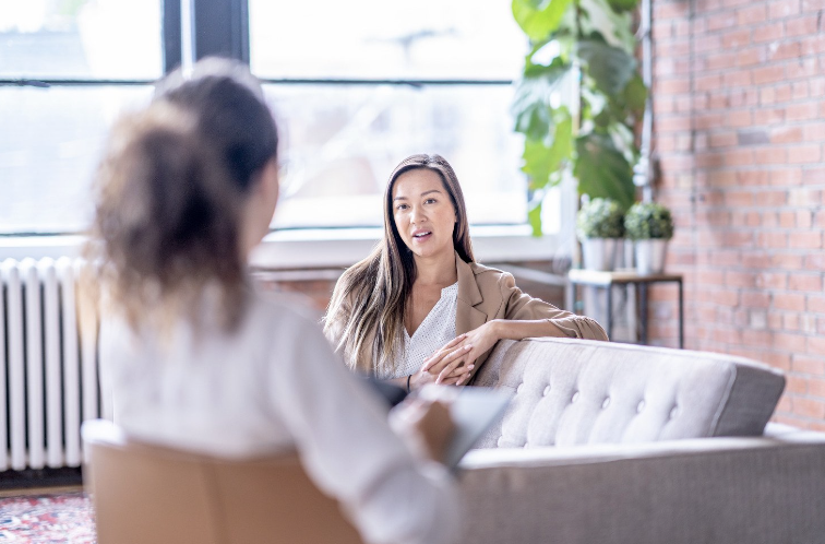 Person talking to therapist using Dialectical Behavior Therapy demonstrating the mental health benefits of Dialectical Behavior Therapy